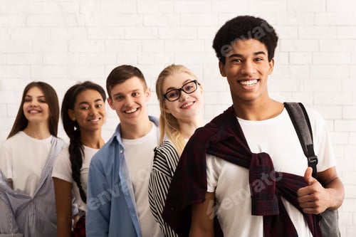 Preview: Education concept. Happy teens smiling to camera