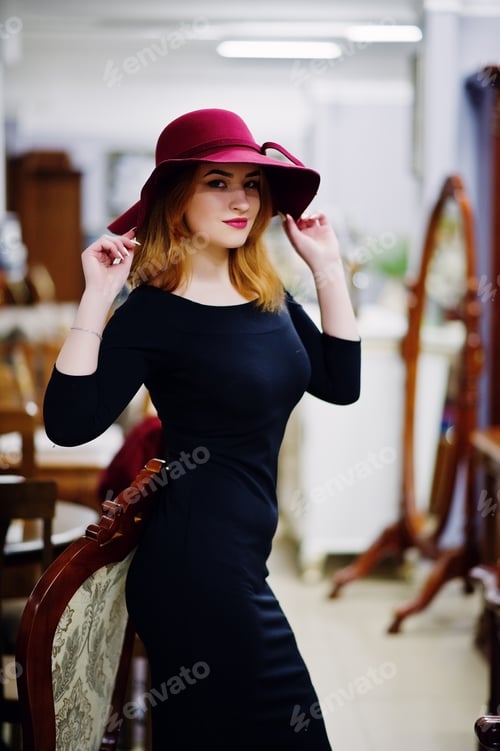 Preview: Portrait of fashion red haired girl on black dress