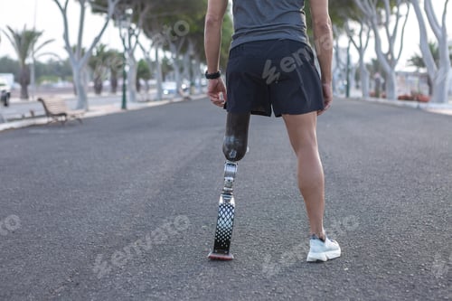 Preview: Crop runner with artificial blade leg standing on asphalt road