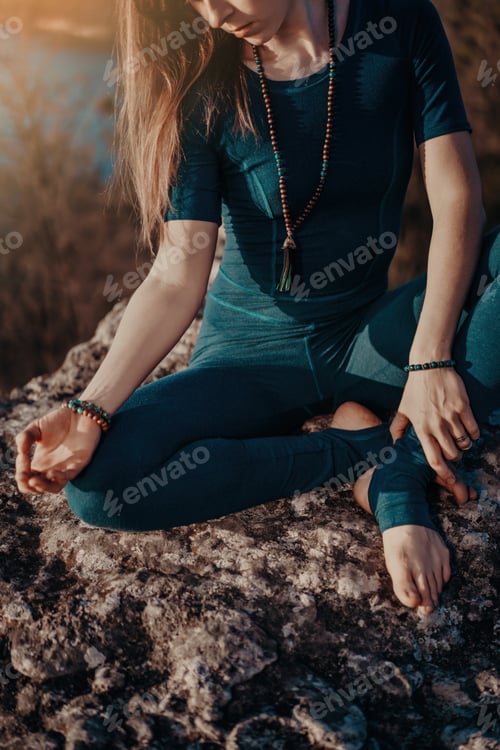 Preview: Mindful fitness coach having zen moment. Everyday yoga practice, calm breath, concentration