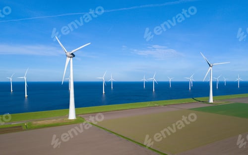 Preview: offshore windmill park and a blue sky, windmill park in the ocean. Netherlands Europe