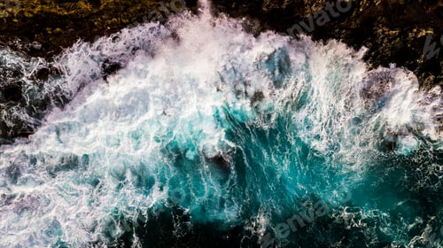 Preview: Aerial top vertical view of big waves at the beach - power of the ocean and dangerous nature