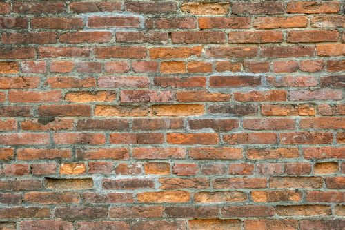 Preview: Weathered old red brick background with rough surface