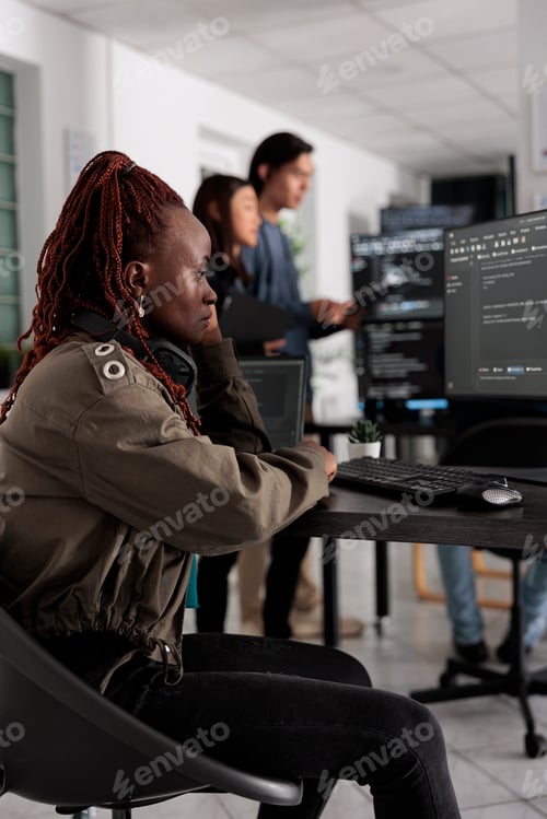 Preview: Pensive african american app developer programming code development