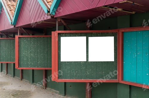 Preview: Empty message boards at a colorful market during a quiet afternoon in autumn