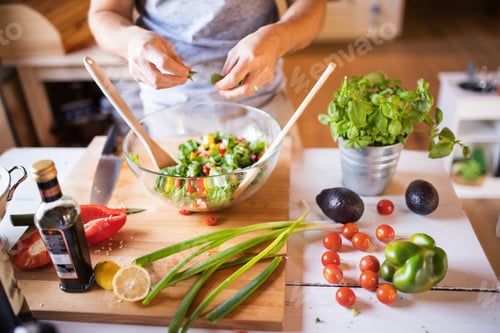 Preview: Unrecognizable man cooking.