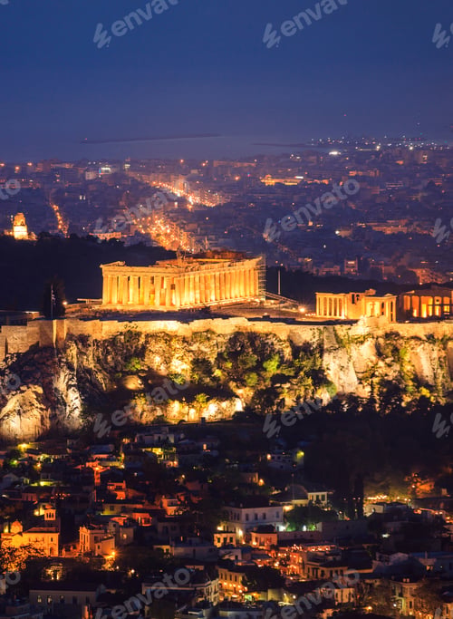 Preview: Vertical view of illuminated Acropolis of Athens. Greece at night background.