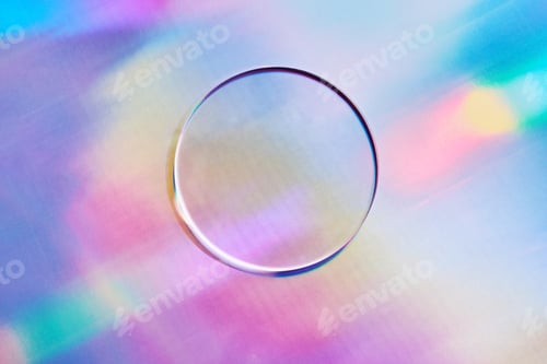 Preview: Empty round petri dish or glass slide on holographic background. Mockup for cosmetic product