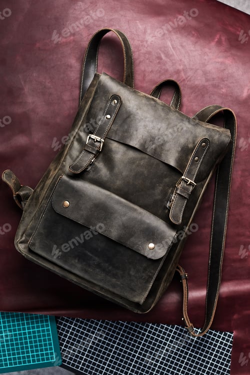 Preview: Leather Backpack accessories isolated hipster background. brown leather bag. Hand made backpack for