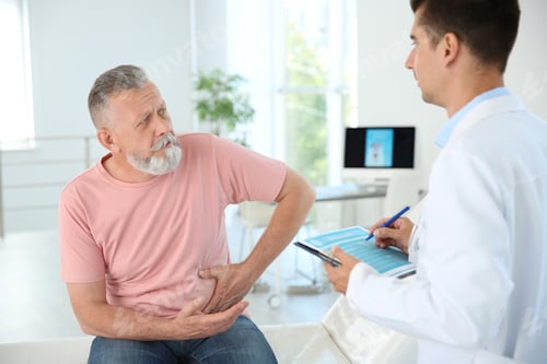 Preview: Man with health problem visiting urologist at hospital