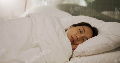 Preview: Woman sleep on bed at night