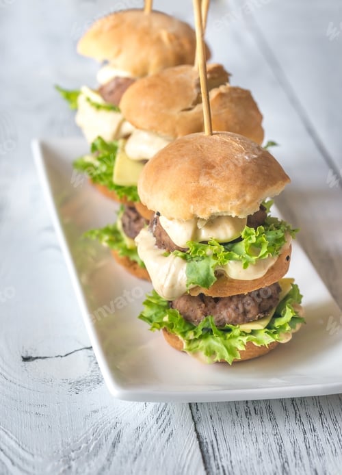 Preview: Miniature Burgers on a Plate with Green Leaf Lettuce