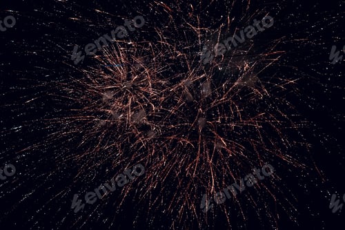 Preview: Beautiful shot of bright fireworks in a night sky