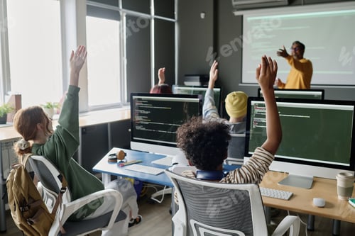 Preview: Multi-ethnic Teenagers Answering During IT Class