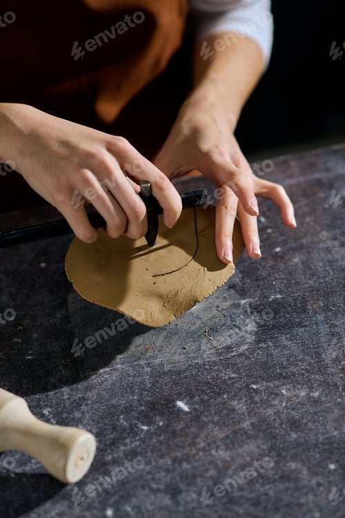 Preview: Creative moments in a pottery studio with a young woman shaping her artistic vision
