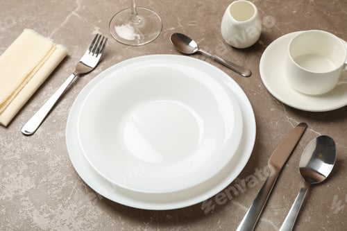 Preview: Composition of table setting with cutlery on gray background