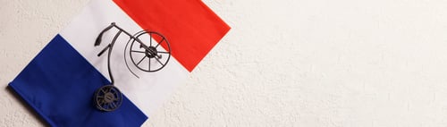 Preview: Tour de France Cycling Race concept. toy bicycles with the flag of France on white background.