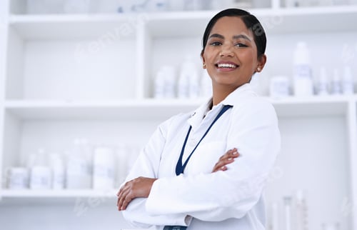Preview: Cropped portrait of an attractive young female scientist standing with her arms folded in the lab