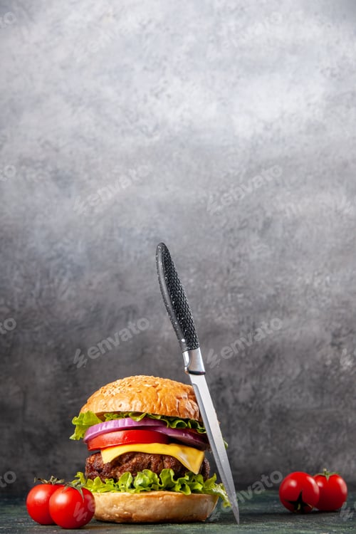Preview: Delicious sandwich tomatoes with stem knife on dark mix color background with free space