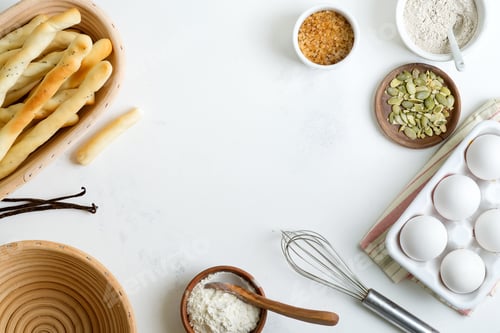 Preview: Natural organic ingredients for baking homemade traditional bread or cakes on a light grey marble