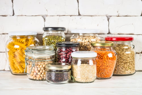 Preview: Cereals, Legumes, and beans in glass jars on white kitchen table