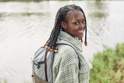 Preview: African teenage girl walking outdoors