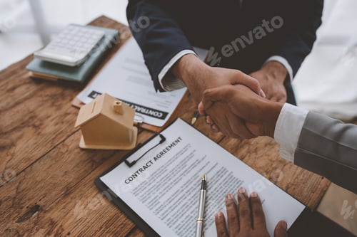 Preview: Handshake of real estate brokers with customers or investors, mortgage loan agreements Make a lease-