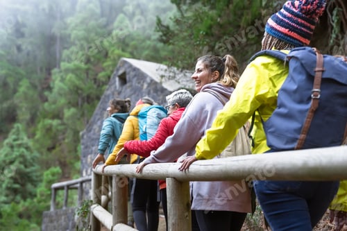 Preview: Group of women with different ages and ethnicities having fun walking in the woods