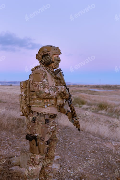 Preview: Man wearing a military uniform with a rifle
