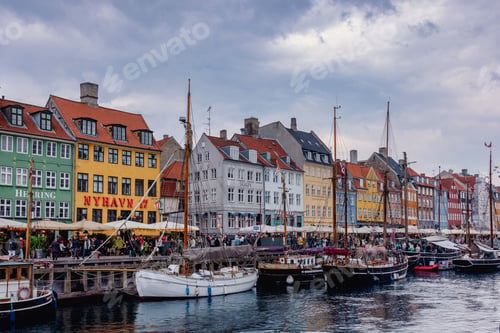 Preview: Colorful buildings and boats along Nyhavn canal in Copenhagen.