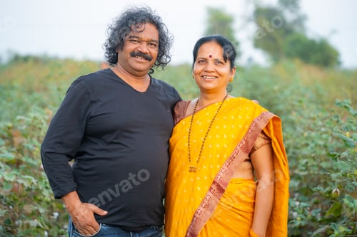 Preview: Happy Indian couple at their farm.