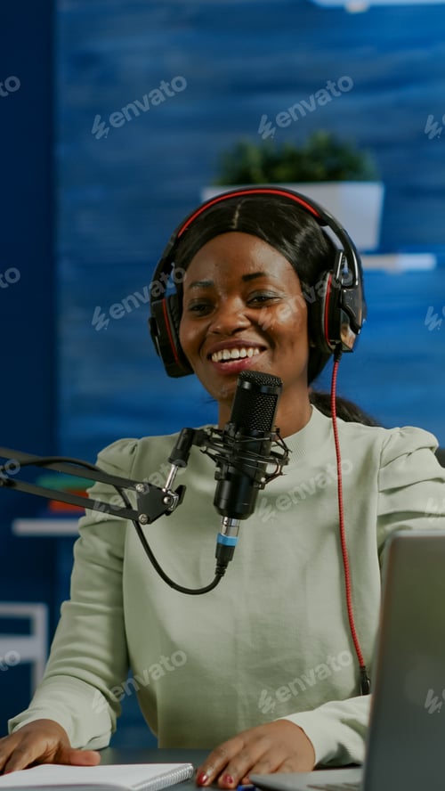 Preview: Woman african vlogger recording to camera tutorial