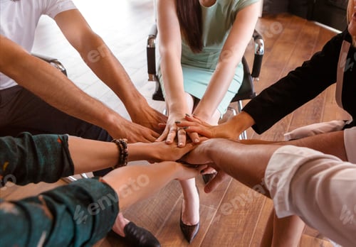 Preview: Business people folding their hands together