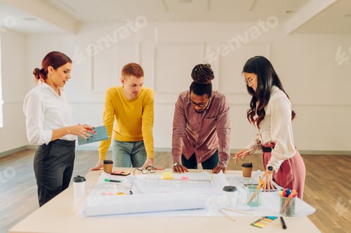 Preview: Diverse group of engineers or architects having a meeting in an office