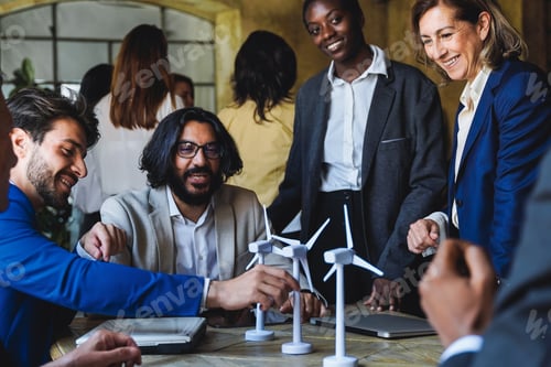 Preview: Happy business people work on sustainable renewable energy project inside office - Eco electricity