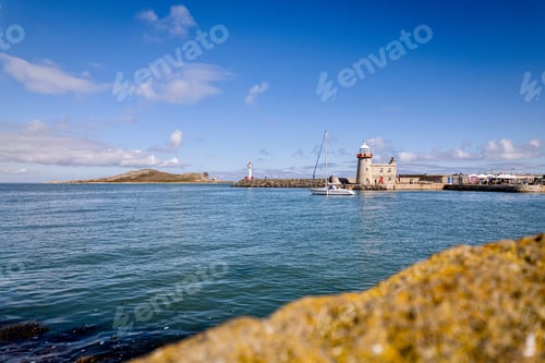 Preview: Howth Harbour Lighthouse on a bright sunny afternoon