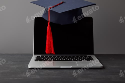 Preview: Graduation Cap on Laptop for Online Learning