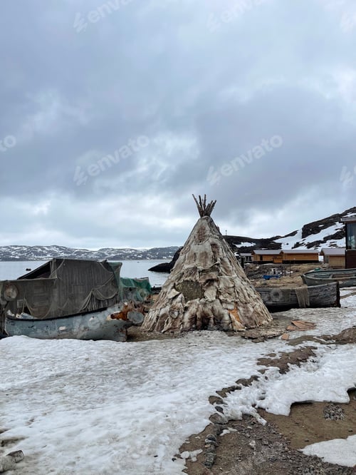 Preview: A tent covered with animal skins, a dwelling of northern peoples on the shore of the Barents Sea