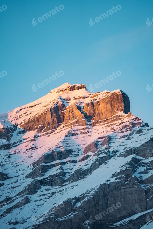 Preview: Beautiful snowy Cascade Mountain over sunset