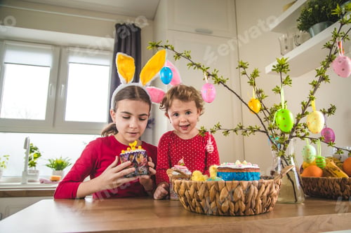 Preview: Happy Easter kid with eggs. Selective focus.