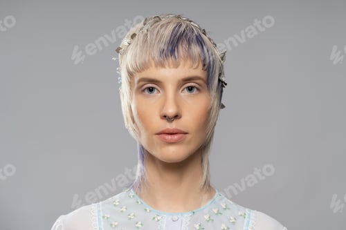 Preview: Close-Up Portrait of Woman with Septum Piercing and Floral Top - Modern and Stylish