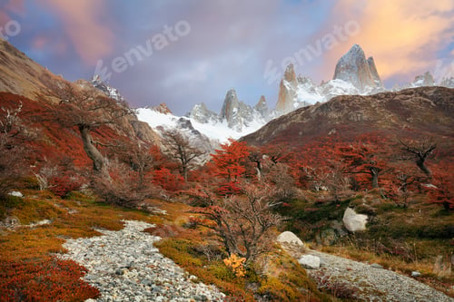 Preview: Patagonia, Argentina. Andes. View on footpath and autumn painted hills in red color.