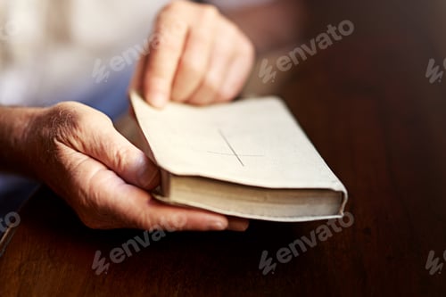 Preview: One on one time with the word of God. Cropped shot of a man opening a bible.