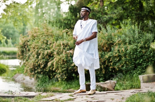 Preview: Rich black man at white national dress