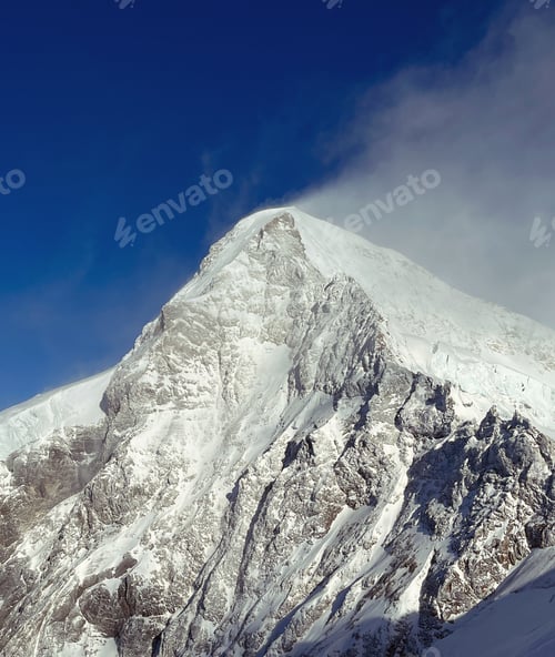 Preview: Snowy slope of a significant tall mountain