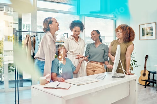 Preview: Businesswomen Laughing Together in Modern Sunny Office