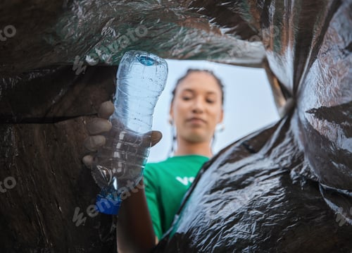 Preview: Recycle, bottle and black woman with view in bag, sustainability and cleaning plastic pollution, ea