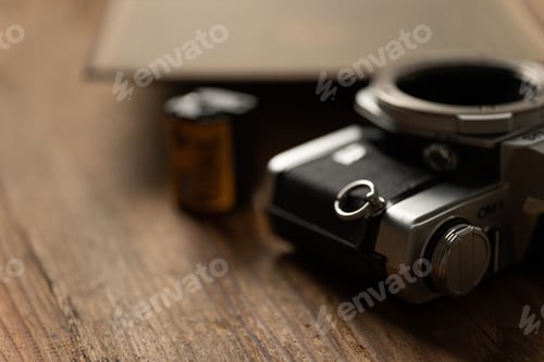 Preview: Retro analog camera on wooden table
