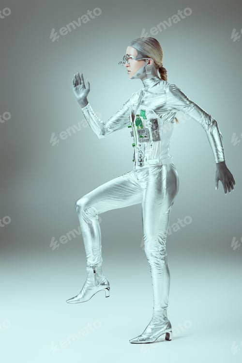 Preview: side view of futuristic cyborg walking on grey, future technology concept