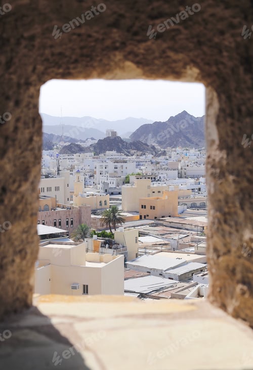 Preview: Muscat through the window of an old fortress